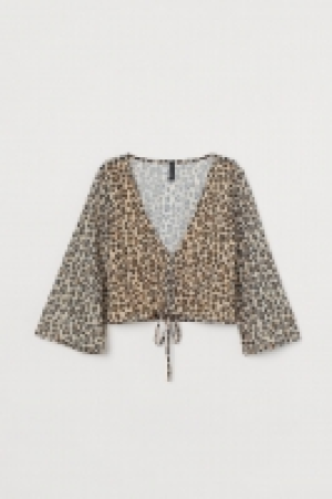  Sequin-embroidered blouse £17.00