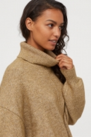  Knitted polo-neck jumper £11.00