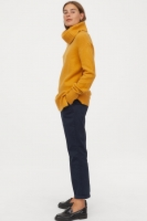  Knitted polo-neck jumper £12.00