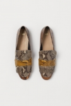  Snakeskin-patterned loafers £10.00
