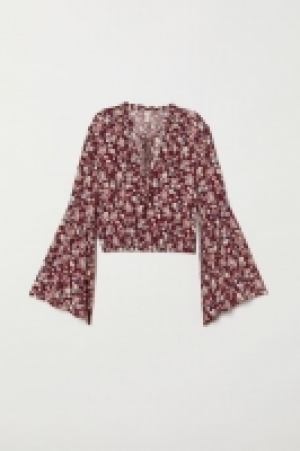 Trumpet-sleeved blouse £12.00