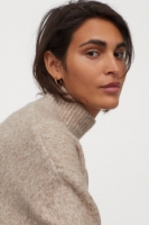 Polo-neck jumper £10.00