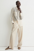 HM  Wide side-slit trousers