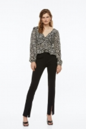 Balloon-sleeved peplum blouse £12.00
