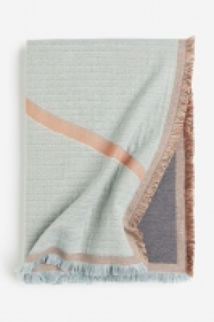 Jacquard-weave blanket £31.00
