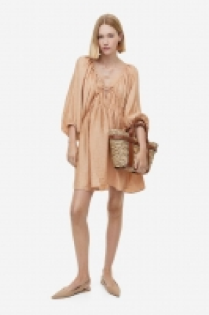 Oversized lyocell-blend dress £19.00