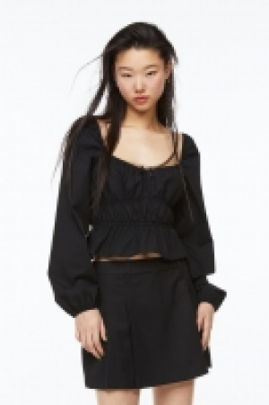 Balloon-sleeved peplum blouse £8.00