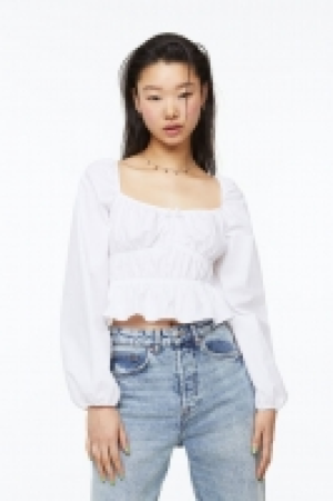 Balloon-sleeved peplum blouse £9.00
