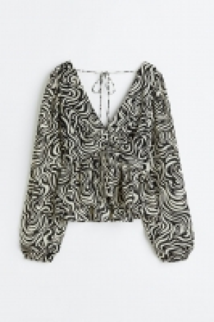 Balloon-sleeved peplum blouse £11.00