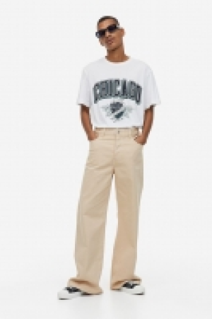 HM  Loose Fit Bootcut twill trousers